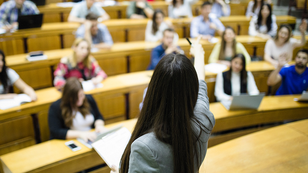 Instructor teaching in a lecture theatre