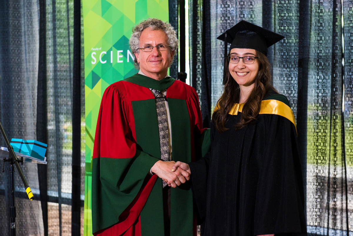 New Faculty of Science alumna Jasmine Aziz (right) stands with Dean Jonathan Schaeffer (left) at the spring convocation reception in June 2017.