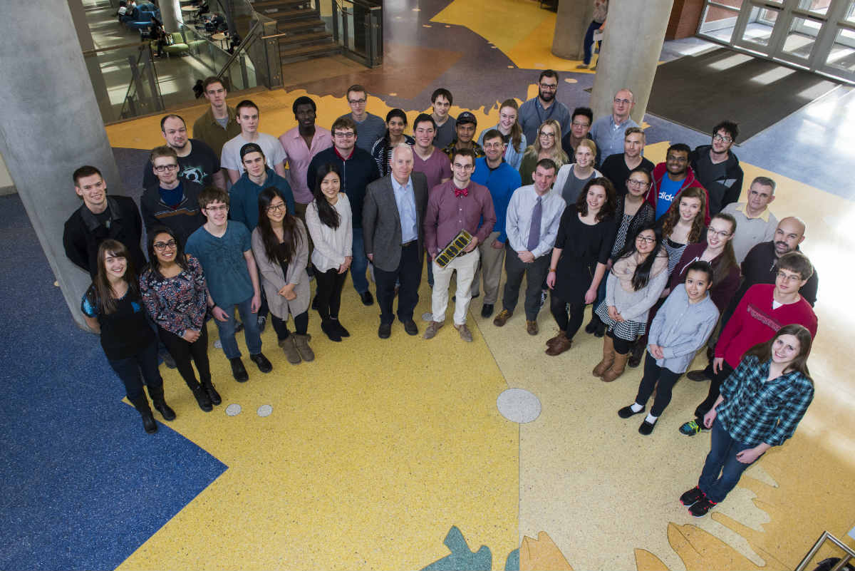 The AlbertaSat team poses with Ex-Alta 1